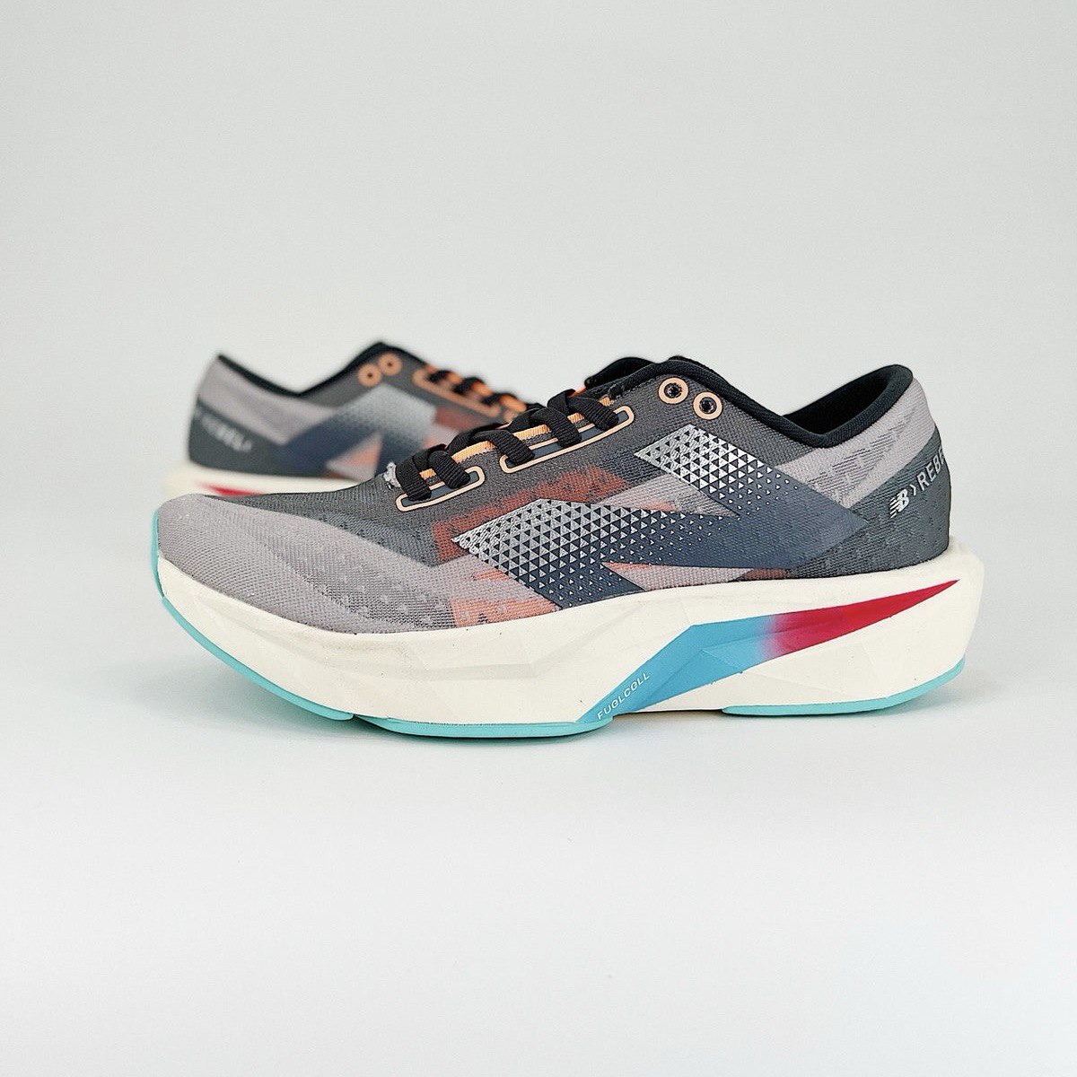 New Balance FuelCell Rebel V4 - Cinza/Azul